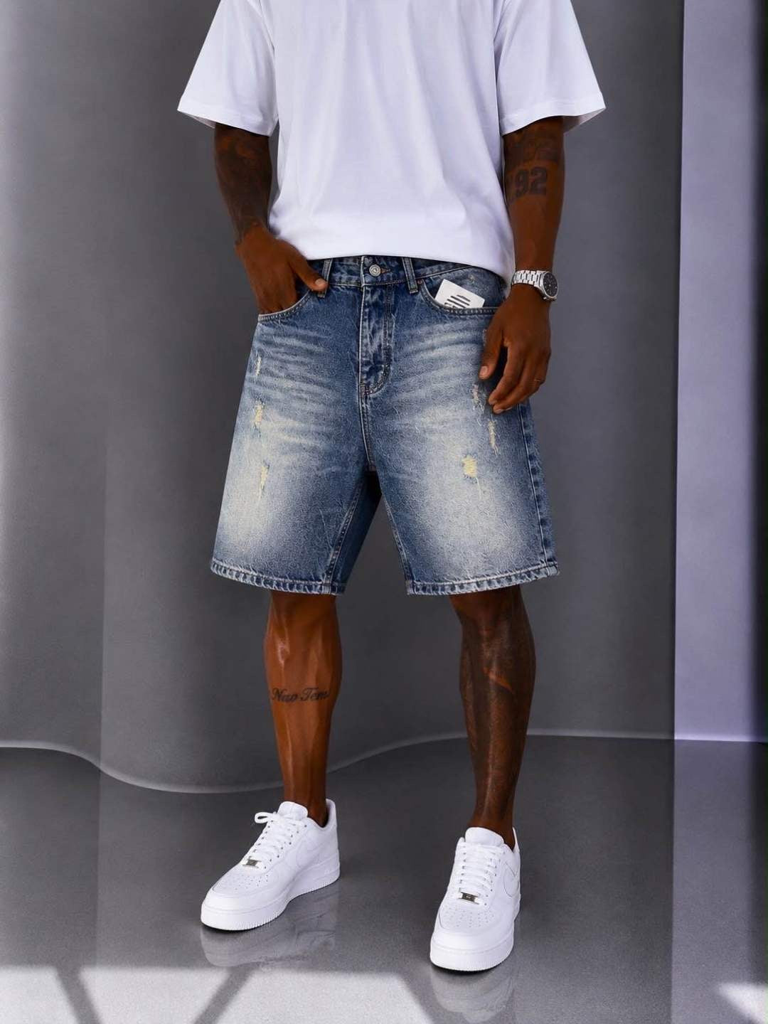 DAMAGED BLUE SHORT