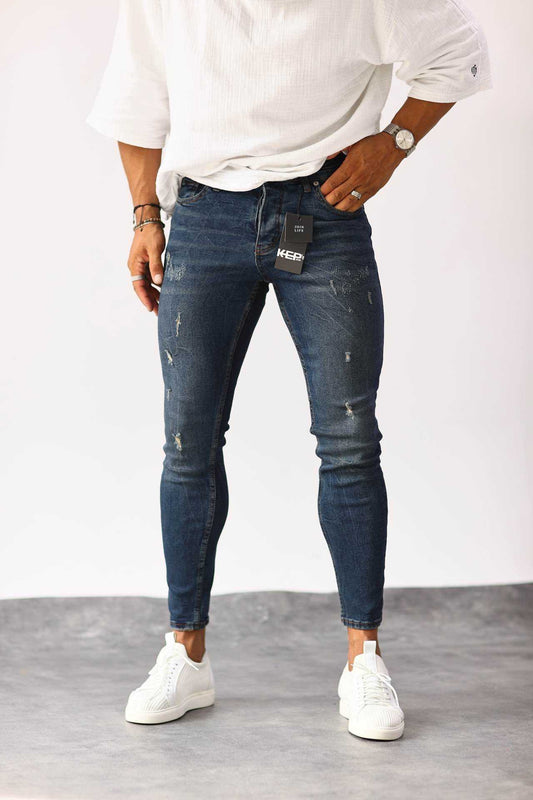 SCRATCHED DARK BLUE FIT JEAN